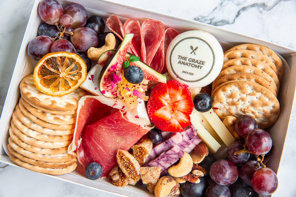 Close up of the graze anatomy's mini charcuterie box.