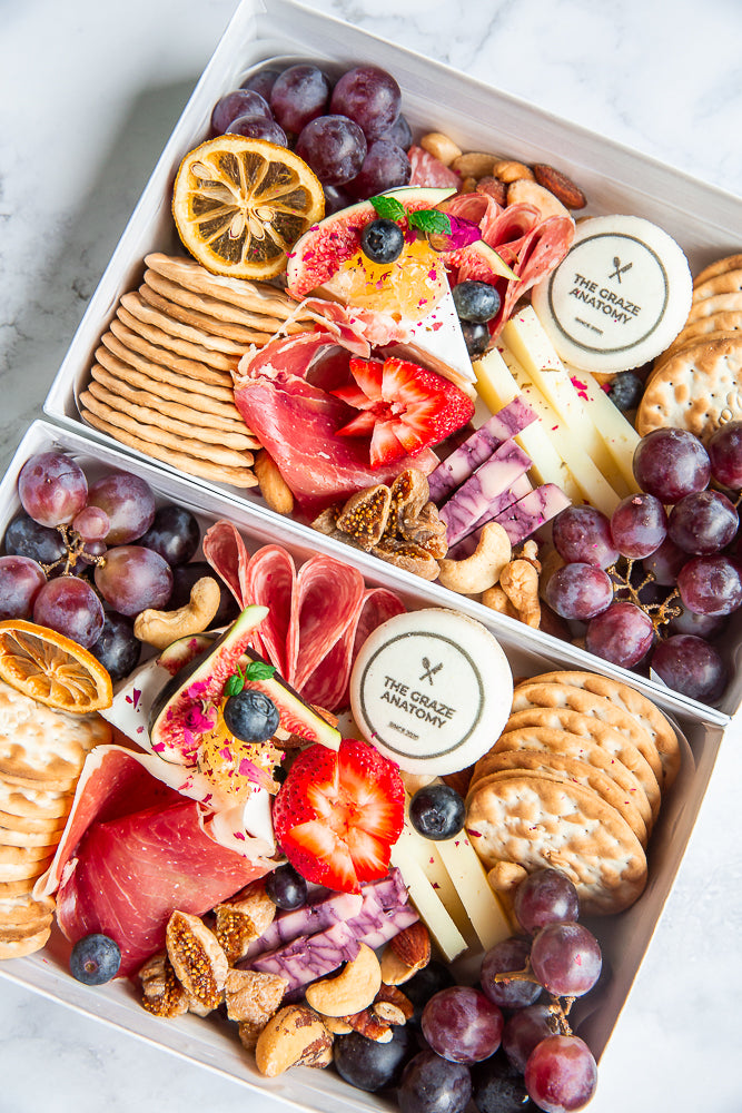 Two Mini Charcuterie Boxes by The Graze Anatomy.