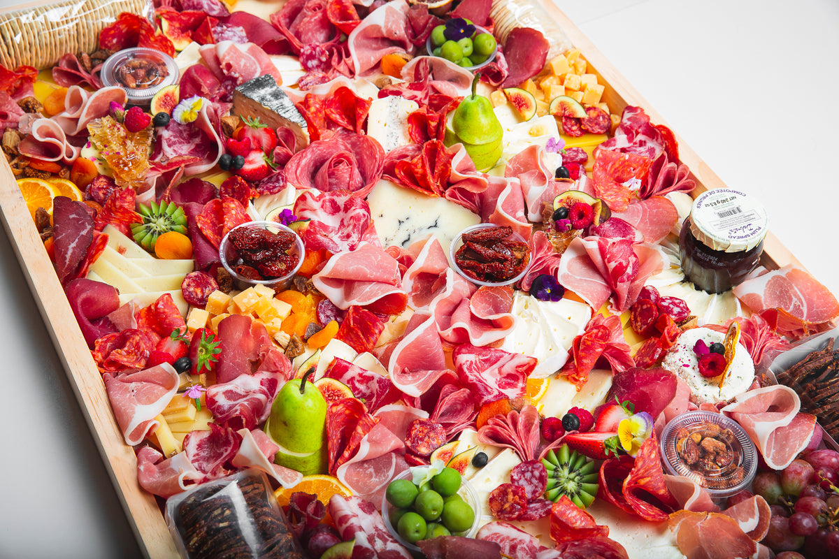 top places to get charcuterie boards delivered to your... The Grande Ultimate Charcuterie Board (Serves 40-50)