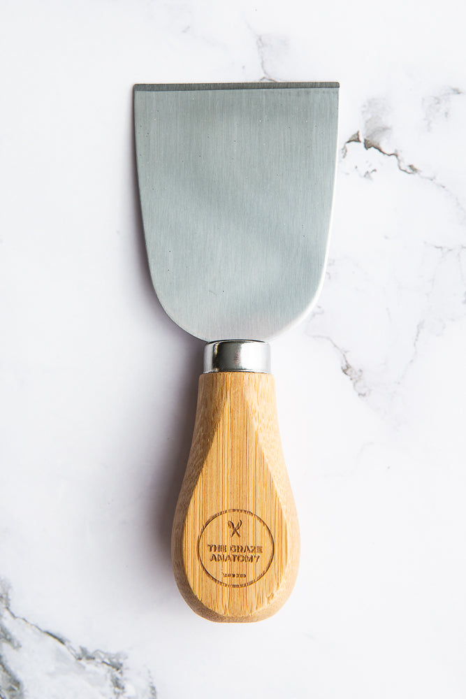 Paddle knife, perfect for soft cheeses like brie that are on our charcuterie boxes and boards.. 